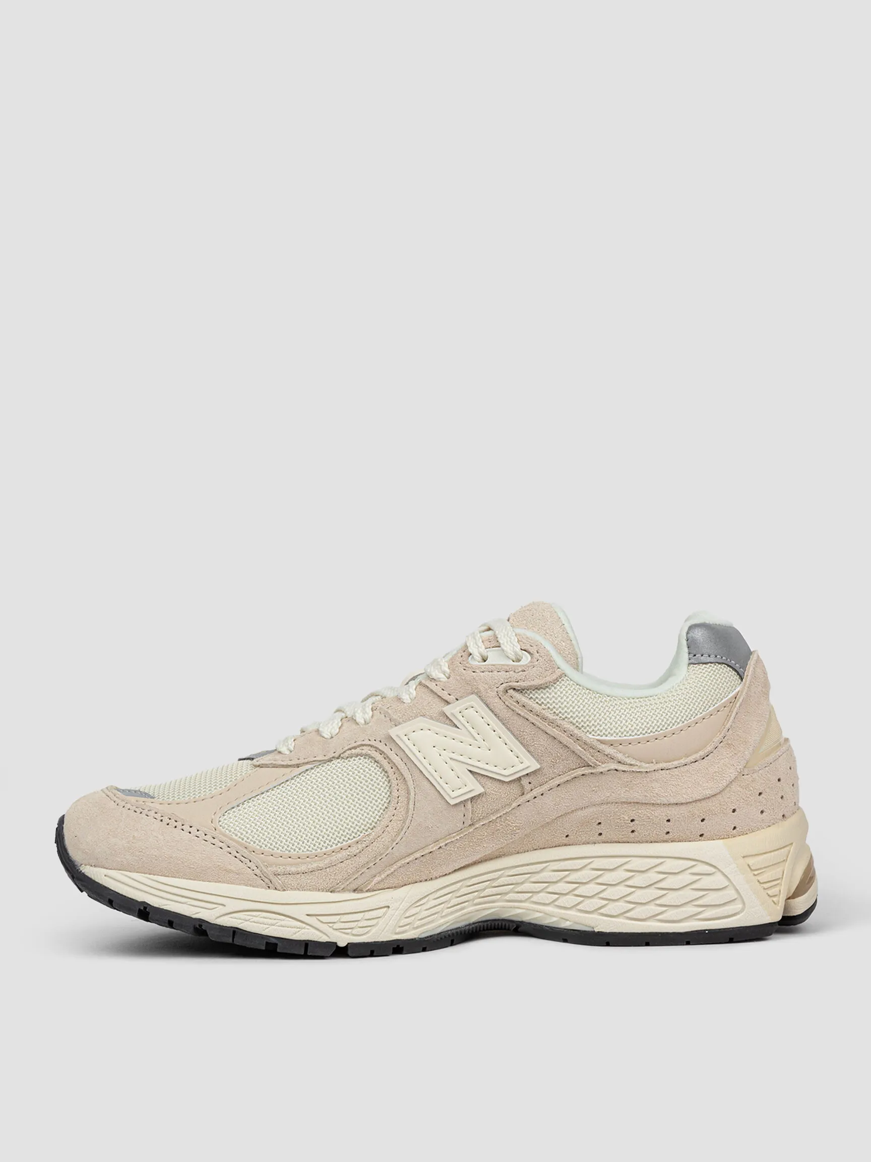 New Balance M2002R, suede sneakers